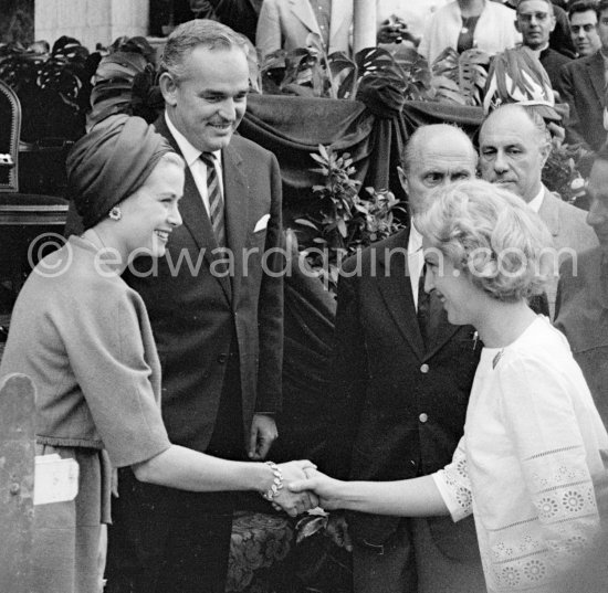 Patty McLaren, wife of Bruce McLaren, presented to Prince Rainier and Princess Grace. Monaco Grand Prix 1962. - Photo by Edward Quinn