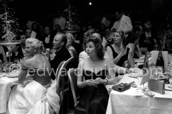 Susan Hayward, Ginger Rogers and Ingrid Bergman during the closing dinner at the Cannes Film Festival in 1956. - Photo by Edward Quinn