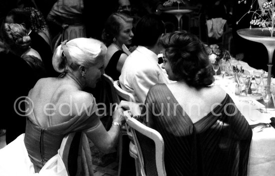 Susan Hayward, American actress and dancer Ginger Rogers and Ingrid Bergman in the background during the closing dinner at the Cannes Film Festival In 1956. - Photo by Edward Quinn