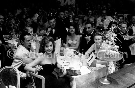 Susan Hayward, the Cannes Festival Organiser Robert Favre Le Bret and Ingrid Bergman behind her during the closing dinner at Cannes Film Festival 1956. - Photo by Edward Quinn