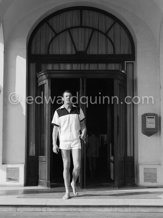 Rock Hudson at the entrance of Carlton Hotel. Cannes 1954. - Photo by Edward Quinn
