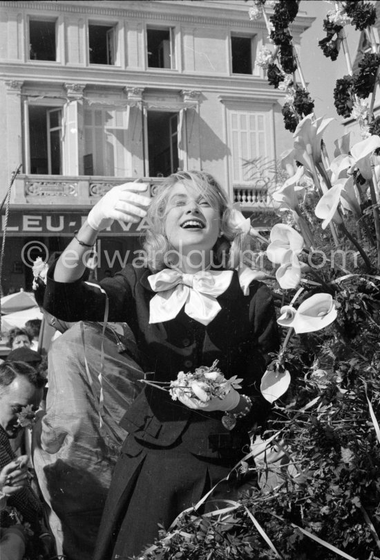 Grace Kelly at the battle of flowers. Cannes Film Festival. Cannes 1955. - Photo by Edward Quinn