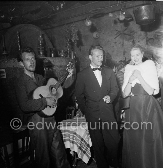Grace Kelly and Jacques Sernas at Restaurant Le vieux Moulin. Cannes 1955. - Photo by Edward Quinn