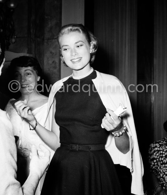 Grace Kelly during a Cocktail Party given by Alfred Hitchcock for the film "To catch a Thief". Cannes 1954. - Photo by Edward Quinn