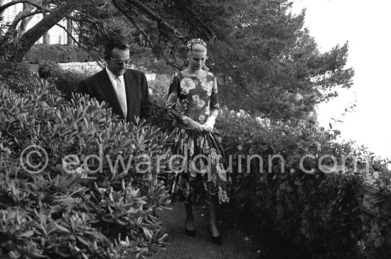 Grace Kelly’s first meeting with Prince Rainier, the man who would become her husband, 1955. To break the ice between two shy people it was decided they should go for a walk in the palace gardens. The couple were married in Monaco the following Year. Monaco 1955. - Photo by Edward Quinn