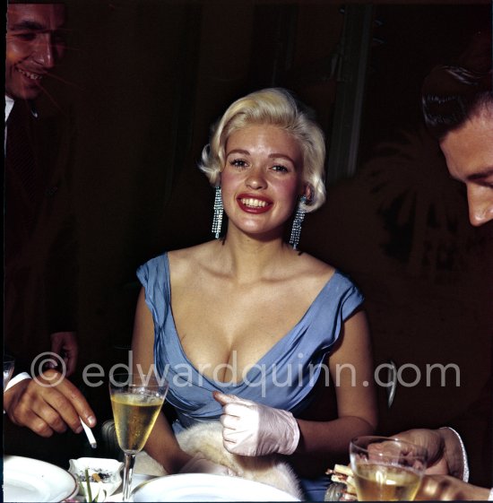 Jayne Mansfield, the bosomy blonde actress who loved to make the headlines, at the Film Festival with her new husband, Mickey Hargitay, the ex-muscleman from Mae West’s nightclub. Cannes 1958. - Photo by Edward Quinn