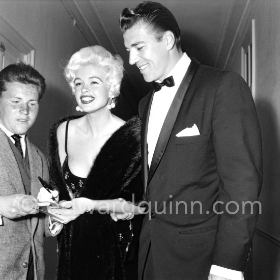 Jayne Mansfield, signing autographs, with her new husband, Mickey Hargitay, the ex-muscleman from Mae West’s nightclub. Cannes 1958. - Photo by Edward Quinn