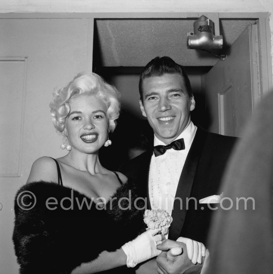 Jayne Mansfield, the bosomy blonde actress who loved to make the headlines, at the Cannes Film Festival in 1958 with her new husband, Mickey Hargitay, the ex-muscleman from Mae West’s nightclub. Cannes 1958. - Photo by Edward Quinn