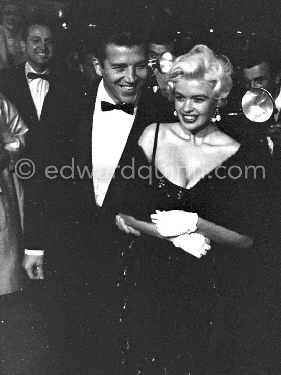 Jayne Mansfield, the bosomy blonde actress who loved to make the headlines, at the Cannes Film Festival in 1958 with her new husband, Mickey Hargitay, the ex-muscleman from Mae West’s nightclub. Cannes 1958. - Photo by Edward Quinn