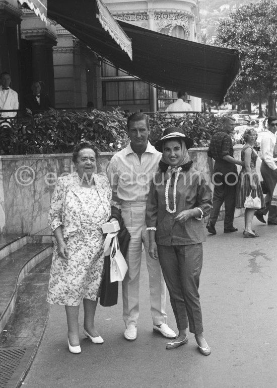 Gossip columnist Elsa Maxwell, Carmen Franco, daughter of General Franco, and her husband Marquis De Villaverde. in front of Hotel de Paris. Monte Carlo 1960. - Photo by Edward Quinn