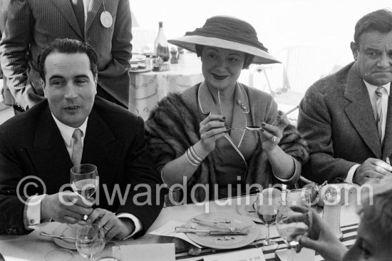 Edwige Feuillère and François Mitterrand at lunch during the Cannes Film Festival 1956. - Photo by Edward Quinn