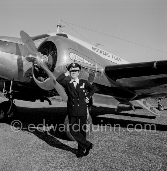 La Môme Moineau (the kid sparrow), "the richest woman of the Côte d\'Azur", former flower seller married to husband Mr. Benítez-Rexach, Dominican ship building millionaire. With one of her husbands gifts, a Beech 18 (85’000’000 francs). Cannes Airport 1954. - Photo by Edward Quinn