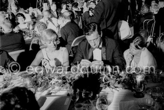 Yves Montand, Catherine Allégret, the daughter of Simone Signoret (right). Inauguration of the Fondation Maeght. Saint-Paul-de-Vence 1964. - Photo by Edward Quinn