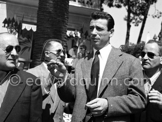 Yves Montand. Cannes Film Festival 1953. - Photo by Edward Quinn