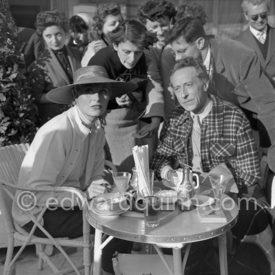 Michèle Morgan and Jean Cocteau. Cannes Film Festival 1954. - Photo by Edward Quinn