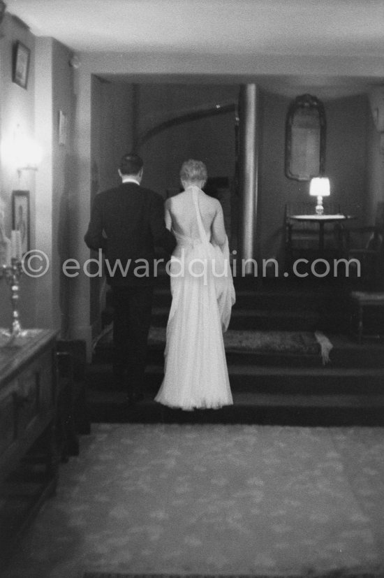 Kim Novak and Rupert Allan, a former LOOK Journalist, back at the Carlton Hotel, after an evening spent at the Beau Brummel Night Club. Cannes 1956. - Photo by Edward Quinn