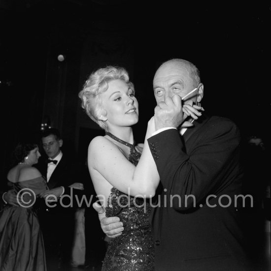 Kim Novak and Otto Preminger at a gala evening. Cannes Film Festival 1956. - Photo by Edward Quinn