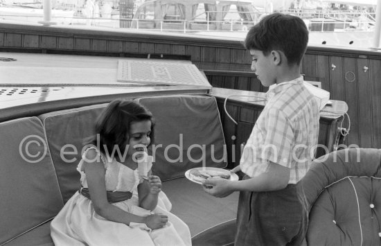Aristotle Onassis and Tina Onassis\' children Alexander and Christina on board Onassis\' yacht Christina. Monaco harbor 1957. - Photo by Edward Quinn