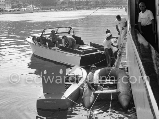 Alexander Onassis on a tender boat of yacht Christina. Monaco harbor 1957. - Photo by Edward Quinn