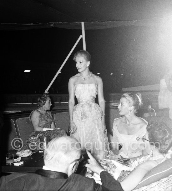 Tina Onassis. Cocktail on Onassis\' yacht Christina. Monaco harbor 1957. - Photo by Edward Quinn