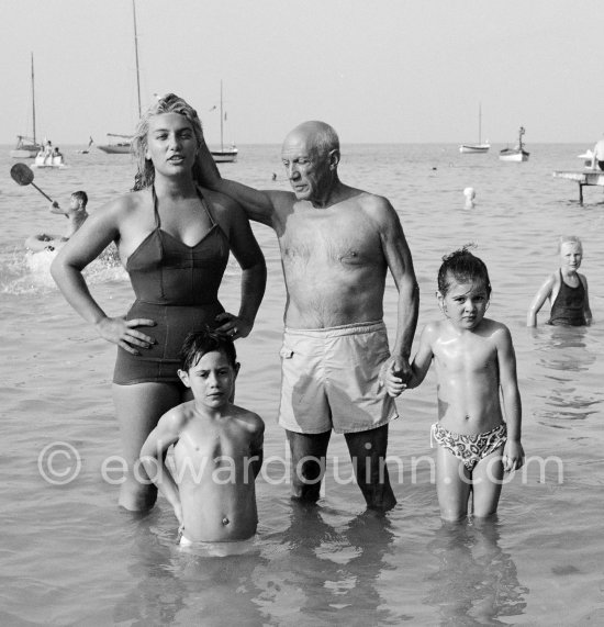 Pablo Picasso with his children Maya Picasso, Paloma Picasso and Claude Picasso at the beach of Golfe-Juan 1954. - Photo by Edward Quinn