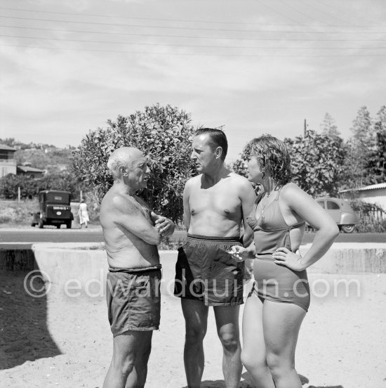 Pablo Picasso, Maya Picasso and not yet identified person. Golfe-Juan 1954. - Photo by Edward Quinn
