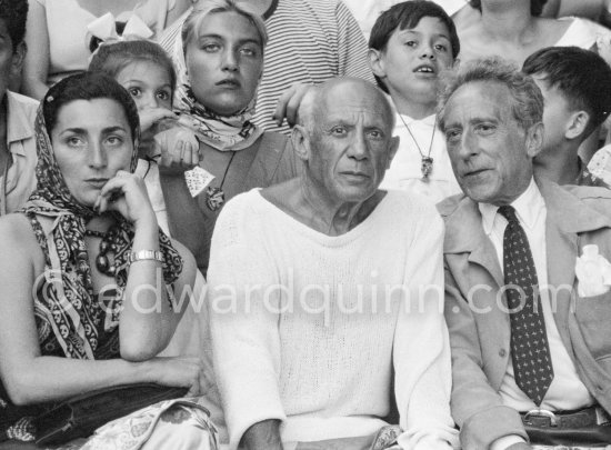 At a local Corrida. On the grandstand from left Jacqueline, Paloma Picasso, Maya Picasso, Pablo Picasso, Claude Picasso and Jean Cocteau, Vallauris 11.8.1955. - Photo by Edward Quinn