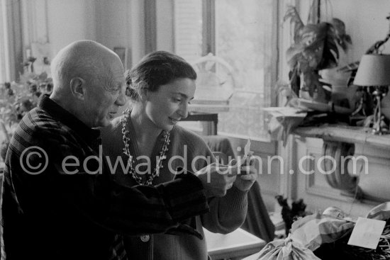 Pablo Picasso and Jacqueline read a congratulations letter for his 75th birthday. La Californie, Cannes 1956. - Photo by Edward Quinn