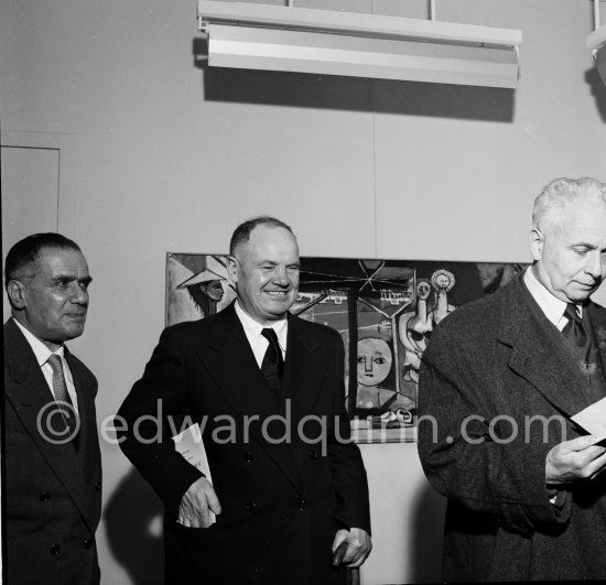 Maurice Thorez, Henri Matarasso and Louis Aragon at a private viewing of Pablo Picasso\'s book illustrations in the Matarasso gallery in Nice. "Pablo Picasso. Un Demi-Siècle de Livres Illustrés". Galerie H. Matarasso. 21.12.1956-31.1.1957. Nice 1956. - Photo by Edward Quinn