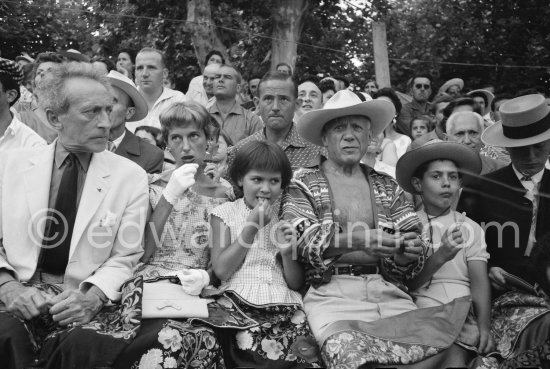 Local Corrida. Jean Cocteau, Francine Weisweiller, Paloma Picasso, Pablo Picasso, Claude Picasso, right French lady bullfighter Pierrette Le Bourdiec. Vallauris 1957. - Photo by Edward Quinn