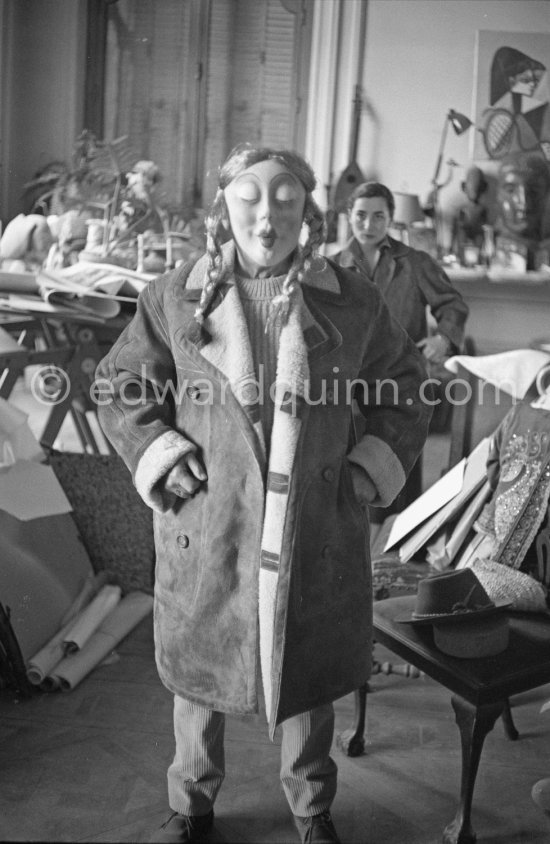 Clown scene: Pablo Picasso in drag. Jacqueline in the background. La Californie, Cannes 1958. - Photo by Edward Quinn