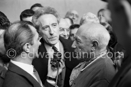 Pablo Picasso and Jean Cocteau interviewed. Unveiling of mural "The Fall of Icarus" for the conference hall of UNESCO building in Paris. The mural is made up of forty wooden panels. Initially titled "The Forces of Life and the Spirit Triumphing over Evil", the composition was renamed in 1958 by George Salles, who preferred the current title, "The Fall of Icarus". Vallauris, 29 March 1958. - Photo by Edward Quinn