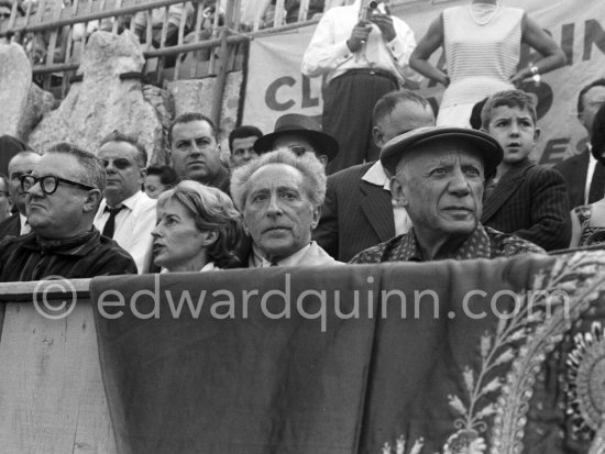 At the bullfight, from left: Douglas Cooper, Francine Weisweiller, Jean Cocteau, Pablo Picasso. Corrida des vendanges. Arles 1959. - Photo by Edward Quinn
