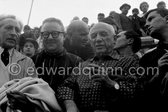At the bullfight from left: Jean Cocteau, Douglas Cooper, Pablo Picasso, Luis Miguel Dominguin (spectator because of injuries). Corrida des vendanges. Arles 1959. - Photo by Edward Quinn