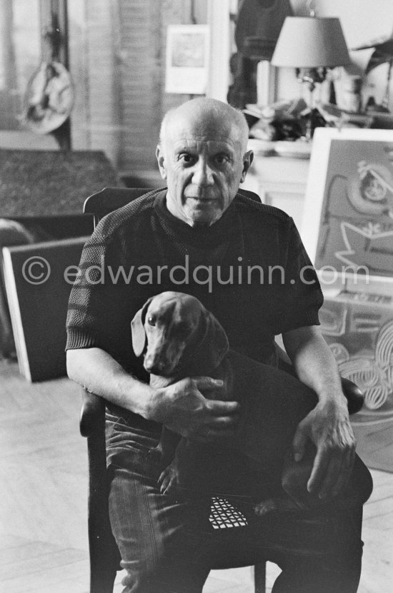 Pablo Picasso with his dachshund Lump. La Californie, Cannes 1959. - Photo by Edward Quinn