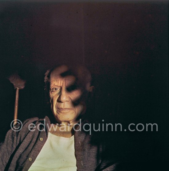 Pablo Picasso in the rocking-chair with a special lighting. La Californie, Cannes 1959. - Photo by Edward Quinn