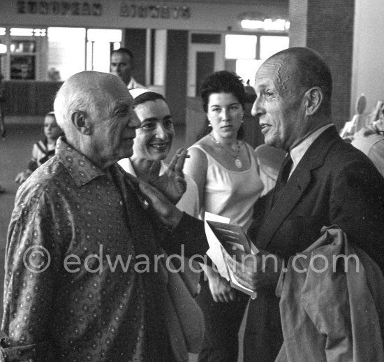 Jacqueline and Pablo Picasso pick up friends. Pablo Picasso, Jacqueline and Michel Leiris. Nice Airport 1960. - Photo by Edward Quinn