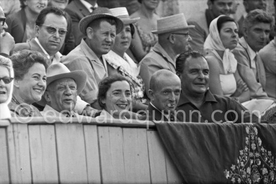 Pablo Picasso with Jacqueline at the the bullfight, on the left of her Michel Leiris, on the right of Pablo Picasso Anna Maria Torra Amat, wife of Spanish publisher Gustavo Gili. Arles 1960. - Photo by Edward Quinn