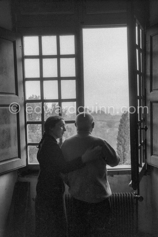 Pablo Picasso and Jacqueline at a window of Château de Vauvenargues 1960, where they lived from 1959-62, in the foothills of Mont Sainte-Victoire, near Aix-en-Provence. - Photo by Edward Quinn