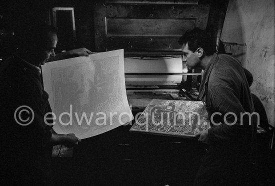 Printer Hidalgo Arnéra with a colleague at his printing press with a Pablo Picasso linocut. Vallauris 1960. - Photo by Edward Quinn