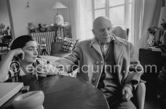 Jacqueline holding Pablo Picasso\'s hand. One of the first photos after his surgery at the British-American Hospital in Paris. Mas Notre-Dame-De-Vie, Mougins 1965. - Photo by Edward Quinn