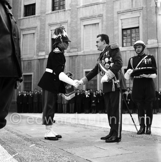 Prince Rainier of Monaco in the courtyard of the Palace during the Monégasque National Festival, Monaco Ville 1954. - Photo by Edward Quinn