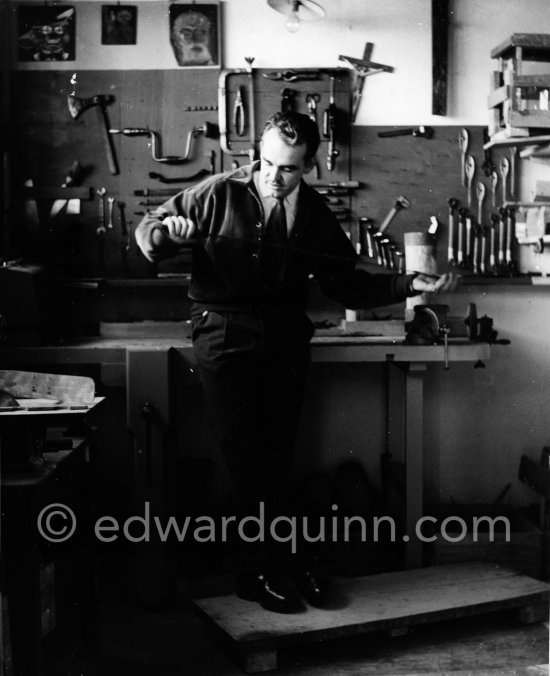 Prince Rainier of Monaco making a sword in his workshop at Villa Iberia, Saint-Jean-Cap-Ferrat1954. - Photo by Edward Quinn