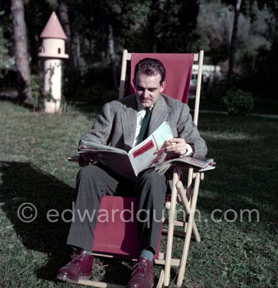 Prince Rainier of Monaco reading in the garden of Villa Iberia, Saint-Jean-Cap-Ferrat 1954. - Photo by Edward Quinn