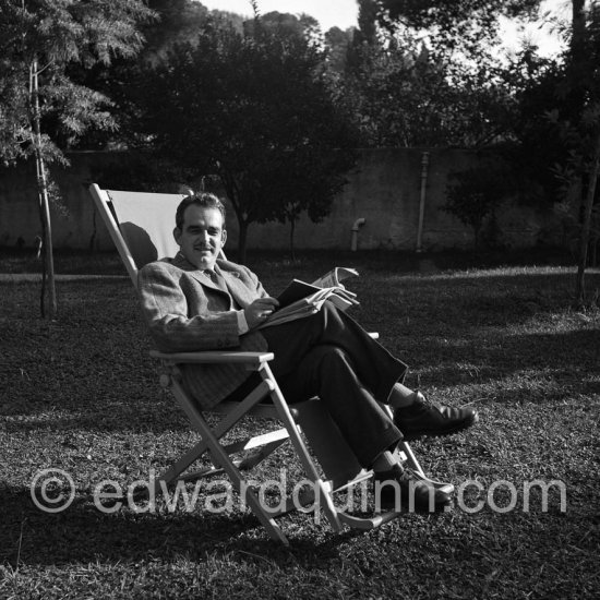 Prince Rainier of Monaco reading in the garden of Villa Iberia, Saint-Jean-Cap-Ferrat 1954. - Photo by Edward Quinn
