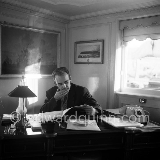 Prince Rainier in the private apartment of his luxury yacht Deo Juvante II anchored in Monaco harbor, 1953. - Photo by Edward Quinn