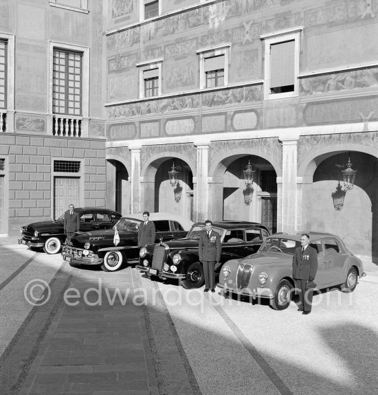 The cars and chauffeurs of Prince Rainier in the court of the Palace. Monaco-Ville 1954. From left:1953. Ford Vedette (Mr. Louche), 1950 Lincoln Cosmopolitan (Mr.Benoit), Mercedes-Benz 300 Limousine (Mr. Raimondo) and Lancia Aurelia B10 Berlina or B21 (RHD) (Mr. Pogliano). - Photo by Edward Quinn