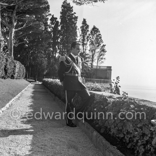 Prince Rainier in the gardens of the palace. Fête Nationale, Monaco 1954. - Photo by Edward Quinn