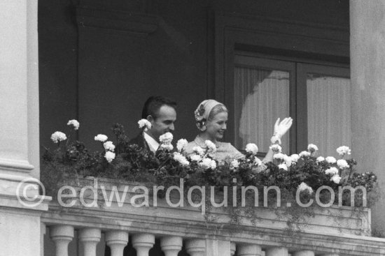 Prince Rainier and Princess Grace after the civil wedding ceremony. The bride wears a simple lace suit while the groom \'a attire was a formalmorning dress suit.The bride was, however, beautiful in the beige lace and dusty rose silk suit that Helen Rose had designed. According to an announcement made by MGM the previous
day, Grace Kelly’s civil ceremony output, white \'naturally not so elaborate 35 the
format down", was \'designed with equal care\'. The ﬁtted bodice had rounded collar and
silk-cord bow at the high neck and closed down the front withlace-covered buttons; the skirt flared into a full hem at at 14 inches above the floor.
The fabric, detailed by MGM’s embroiderers to produce an unusual effect, added
interest to the simple suit: over a foundation of what MGM called "ashes of roses
taffetas the moral pattern of the machine-made "blush-tan" lace was outlined with
dusty pink silk floss embroidery for additional depth. The accessories that
completed the bridal ensemble were also carefully considered and constructed.
A small, close-ﬁtting hat trimmed with silk ﬂowers, designed by Helen Rose, sat
prettily on the back of the head. Dusty Fink silk pumps with lace overlay to match
the suit were created by leading American shoe designer David Evins. Short white
gloves added the anal touch. - Photo by Edward Quinn