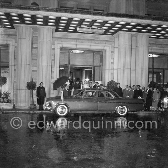 Prince Rainier and Princess Grace leaving the International Sporting Club. Monte Carlo 1956. Car: 1956. Imperial (Chrysler) four-door sedan (Grace Kelly) - Photo by Edward Quinn